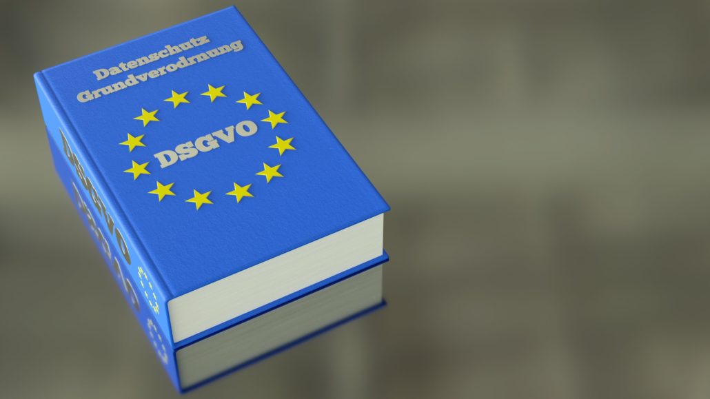 Buch mit der Aufschrift Datenschutz-Grundverordnung DSGVO